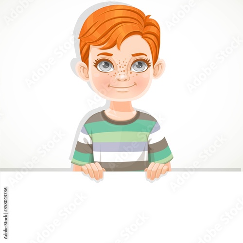 Cute red haired boy holds large white horizontal banner on a white background