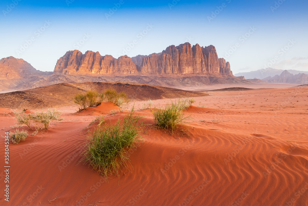 Wadi Rum Desert, Jordan. The red desert and Jabal Al Qattar mountain.