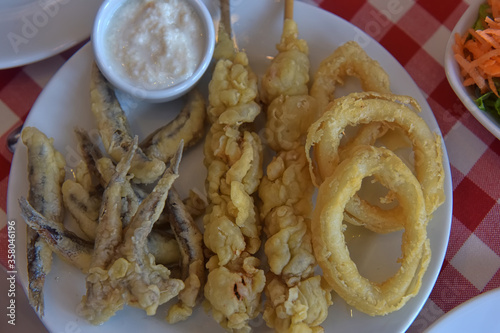 fried fish and squid rings photo