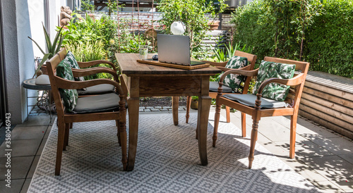 Laptop workstation on a patio