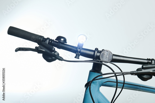 Flash light on bicycle handle bar
