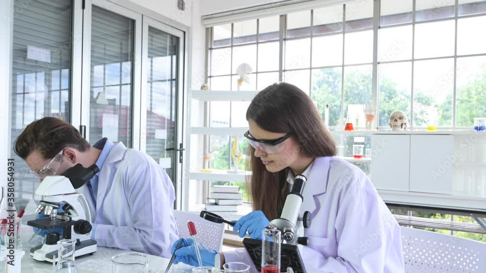scientists working in laboratory scientists working in laboratory