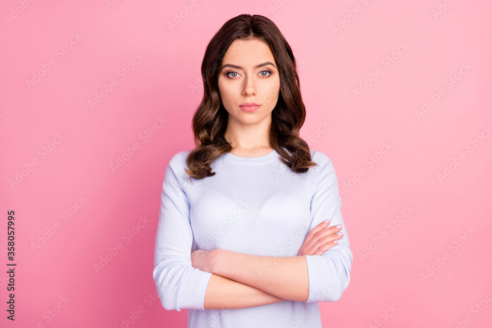 Photo of attractive pretty lady not smiling self-confident business woman arms crossed bossy look wear casual white pullover isolated pink color background Photo of attractive pretty lady not smiling self-confident business woman arms crossed bossy look wear casual white pullover isolated pink color background