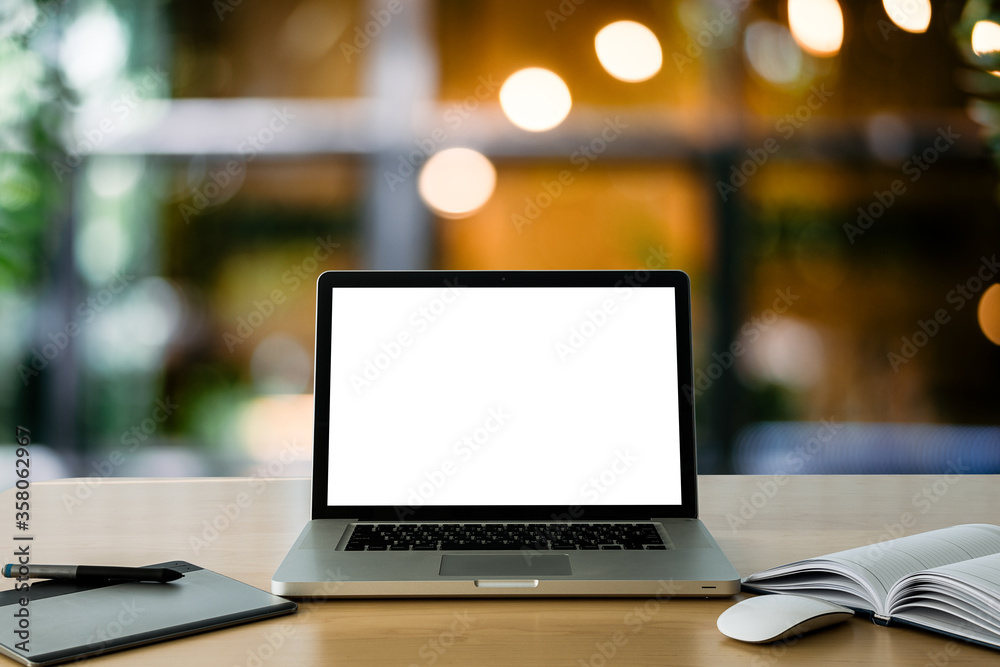 laptop on the wood desk. laptop on the wood desk.
