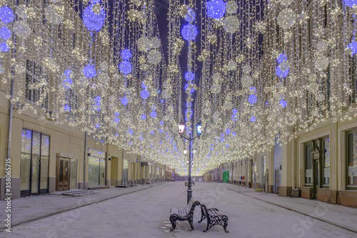 Christmas and New Year decoration with illumination Nikolskaya street in Moscow city. Beautiful night view with no people.