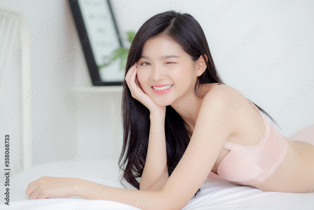 Beautiful portrait young asian woman sexy in underwear figure fit relax with seductive in bedroom, asia girl body slim in lingerie confident and happy lying on bed in bedchamber, lifestyle concept. Beautiful portrait young asian woman sexy in underwear figure fit relax with seductive in bedroom, asia girl body slim in lingerie confident and happy lying on bed in bedchamber, lifestyle concept.