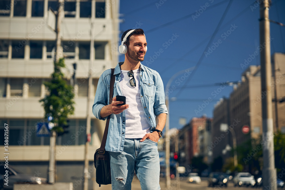 Joyful brunette man enjoying his active weekend Joyful brunette man enjoying his active weekend