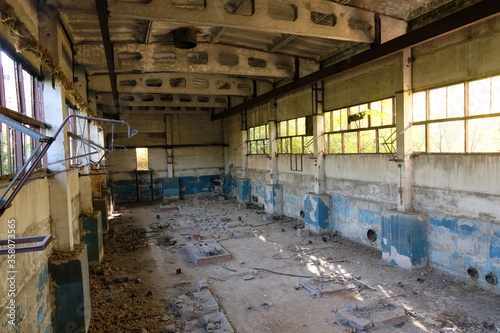 Old broken empty abandoned industrial building interior