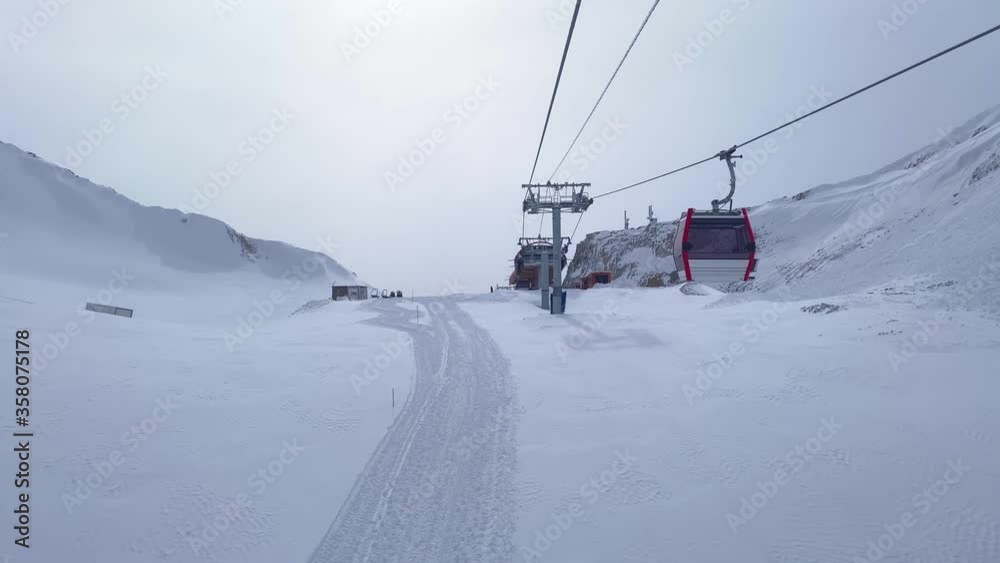 Cableway lifting in winter ski resort. Cableway lifting in winter ski resort.