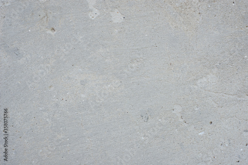 Background texture of modern gray concrete wall made of blocks