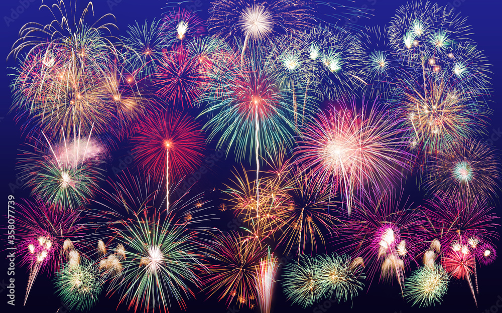 colorful fireworks fully shining on dark blue background