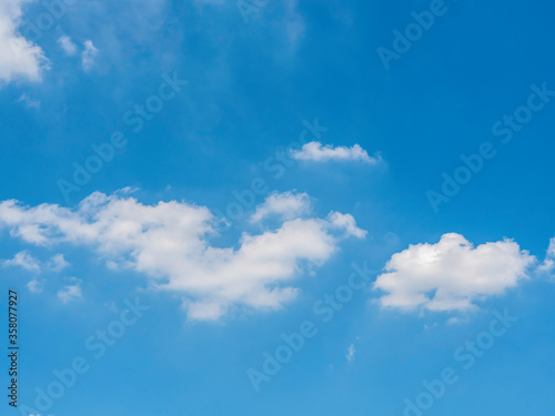 The sky is bright with the blue sky and a beautiful heart shaped cloud can be seen in the background.