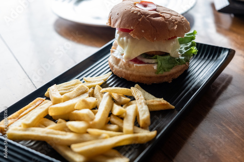Canvas Print Tasty hamburger with french fries