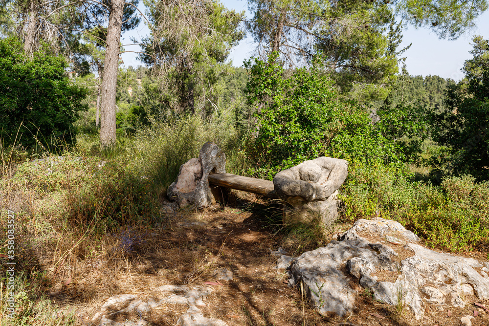 A bench carved from stone in the Totem park in the forest near the settlements of Har Adar and Abu Ghosh A bench carved from stone in the Totem park in the forest near the settlements of Har Adar and Abu Ghosh