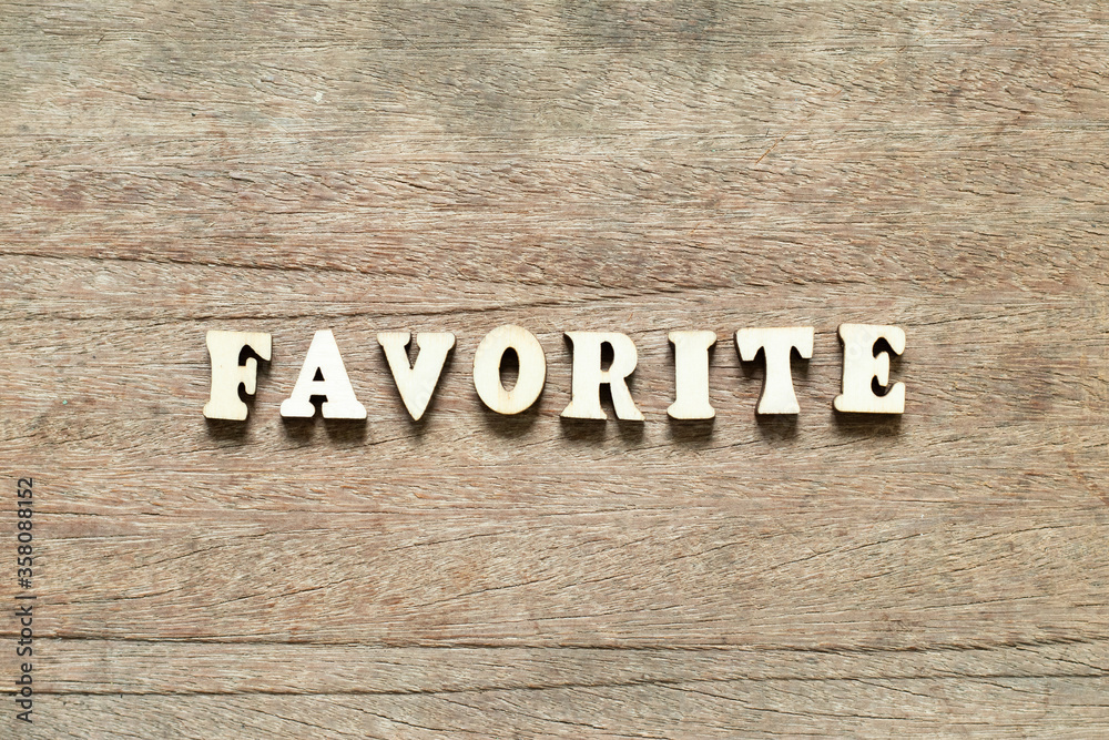 Alphabet letter block in word favorite on wood background