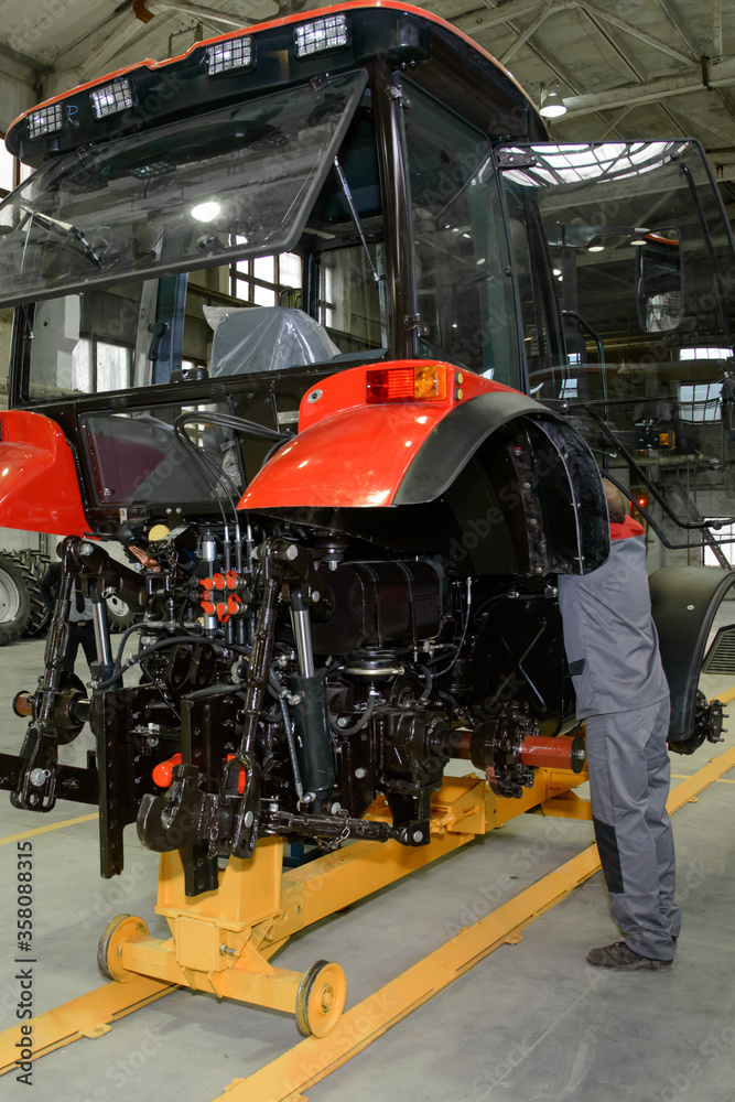 tractor Assembly on the conveyor, engine, spare parts