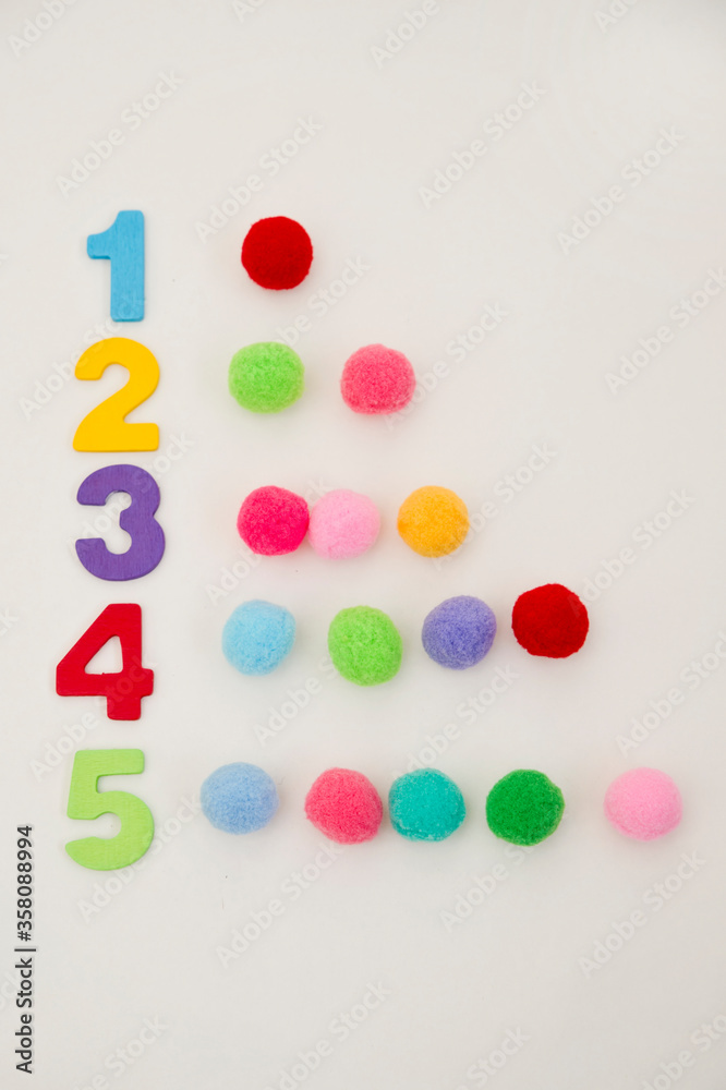 Naklejka premium Digits and Pom Poms. Numbers and dots. Counting game for early education. Preschool exercise for kids. Sequence from 1 to 10.
