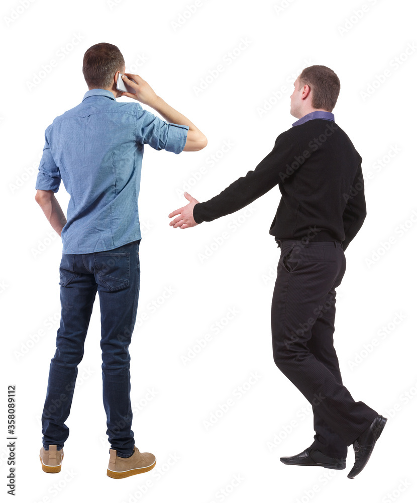 Back view of two business man in suit with mobile phone. Back view of two business man in suit with mobile phone.