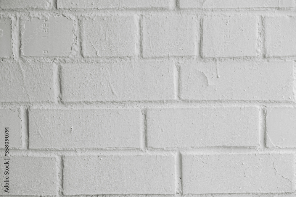 Fototapeta premium Modern white brick wall texture background for wallpaper and graphic web design.