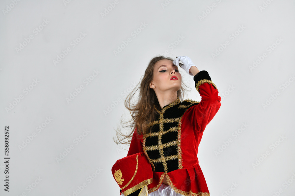 beautiful girl in red hussar uniform with loose hair beautiful girl in red hussar uniform with loose hair