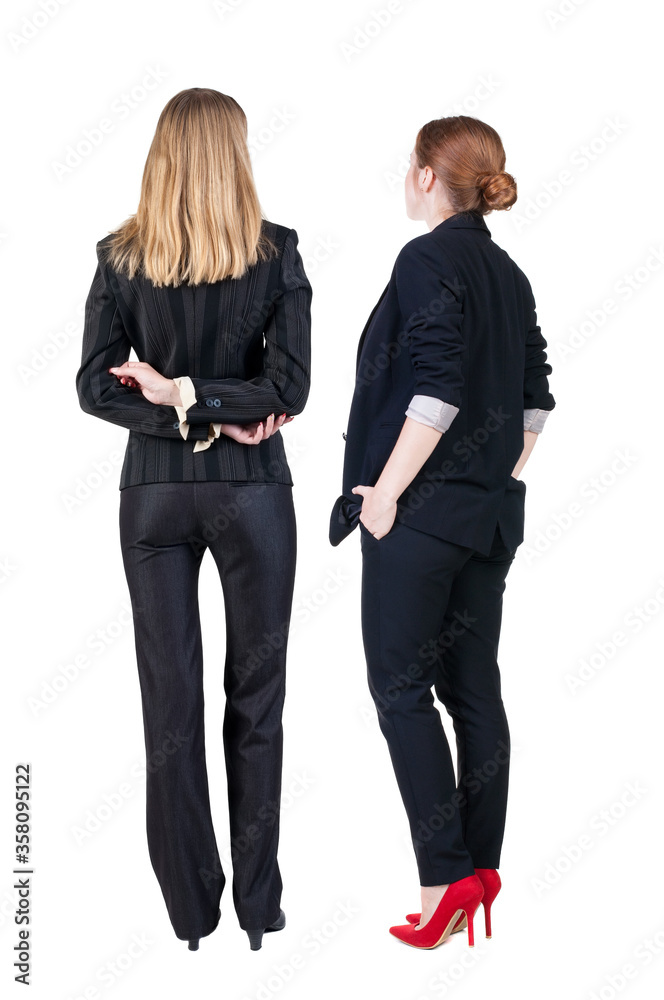 Back view of two business woman in suit. Back view of two business woman in suit.