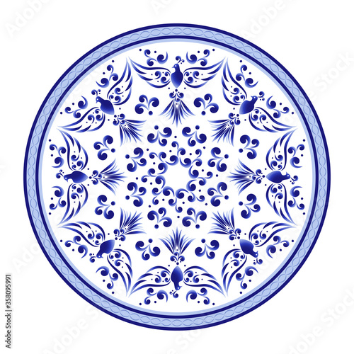 Round plate with a stylized bird surrounded by a floral pattern in Russian folk style Gzhel