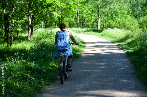 Wallpaper Mural young woman riding a bicycle Torontodigital.ca