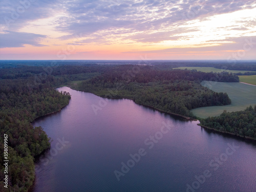 Magical sunset over lake in Belarus. Drone aerial photo