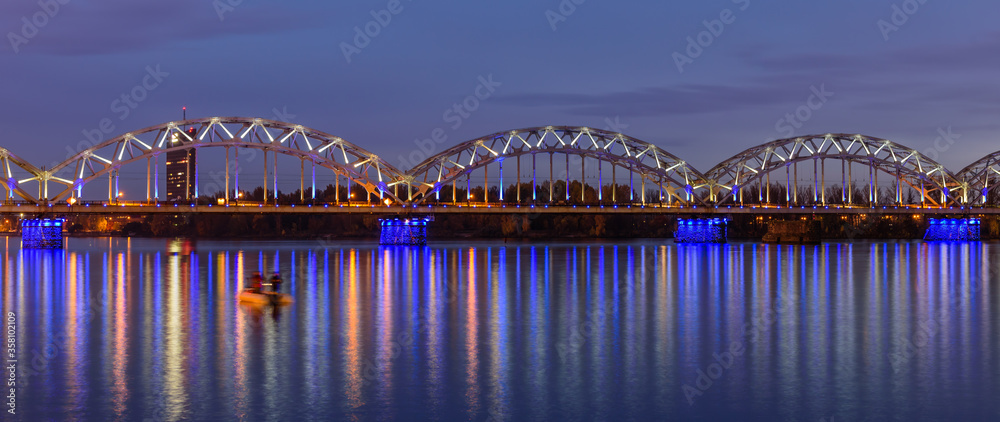 Fototapeta premium Bridge over Daugava river, beautiful night view, Riga, Latvia
