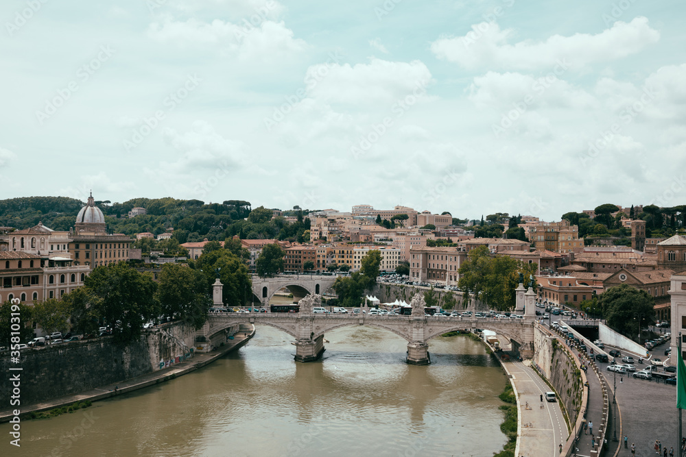 Panoramic view on the Papal Basilica of St. Peter in the Vatican and river Tiber