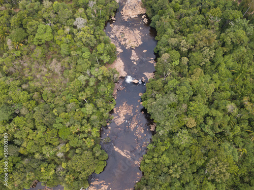 Beautiful drone aerial view over Curua River waterfalls and forest trees in the Serra do Cachimbo in the Amazon rainforest, Para, Brazil. Concept of ecology, environment, conservation, nature, co2. photo