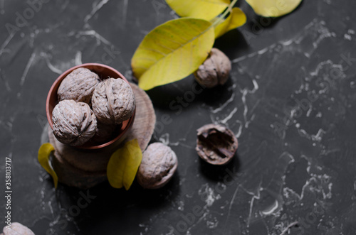 walnuts on a black background