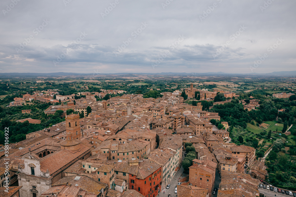 Panoramic view of Siena city with historic buildings and streets Panoramic view of Siena city with historic buildings and streets