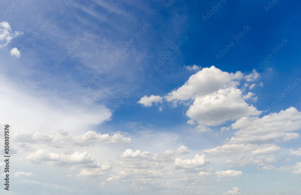 blue sky and white fluffy cloud horizon outdoor for background.