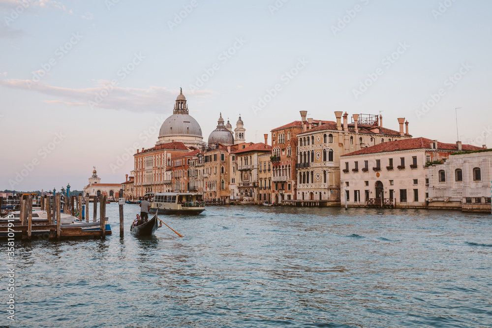 Panoramic view of Venice grand canal view with historical buildings and gondola