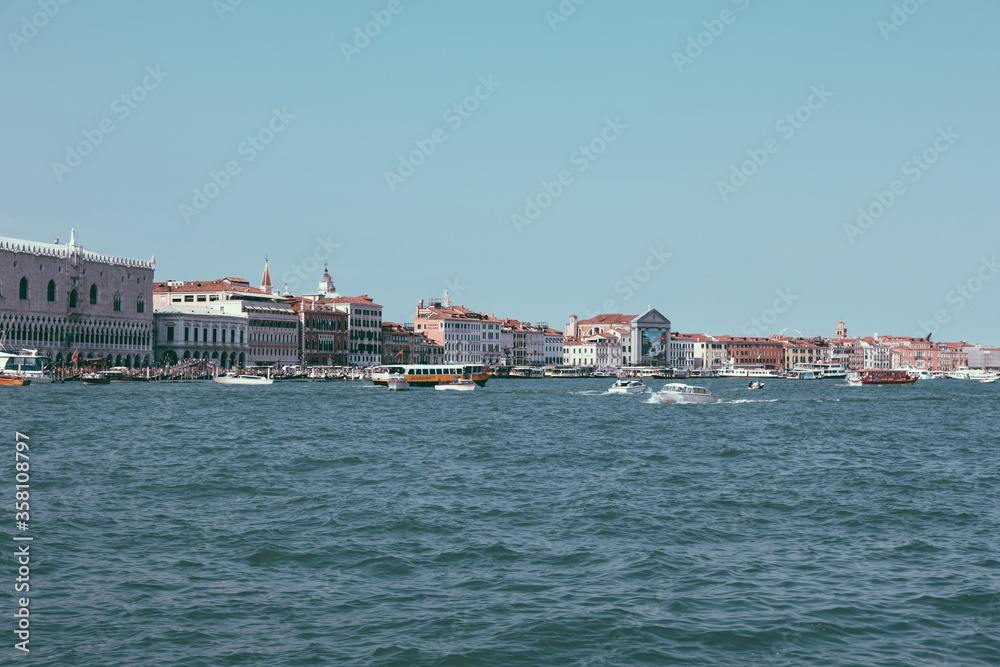 Panoramic view of Venice coast with historical buildings and Laguna Veneta Panoramic view of Venice coast with historical buildings and Laguna Veneta