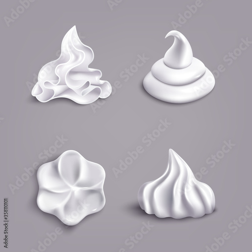 Realistic white whipped cream swirl shape set isolated on grey background