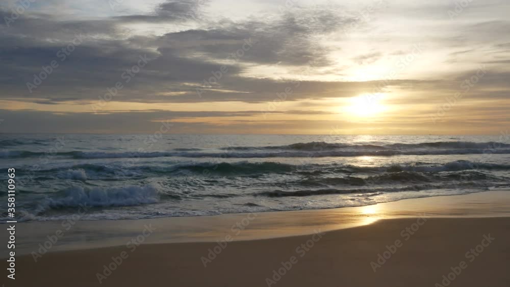 sea wave water hit sand beach , reflection in water, cloudy sky with sunset background sea wave water hit sand beach , reflection in water, cloudy sky with sunset background