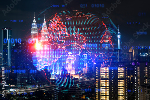 Canvas Print Hologram of Earth planet map on night panoramic cityscape of Kuala Lumpur, Malaysia, Asia