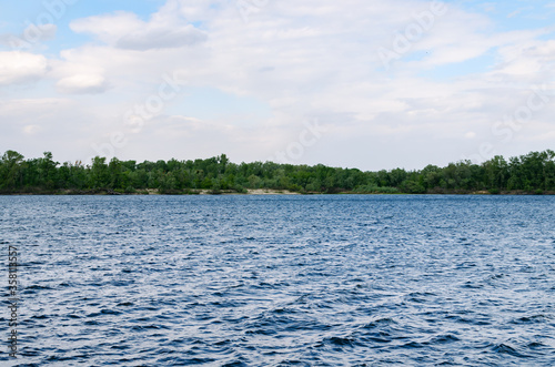 waves on the Kanevsky reservoir, enjoy on a cloudy day © Alla 