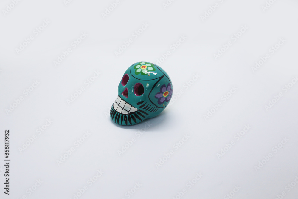 Skull, a green porcelain decorative object