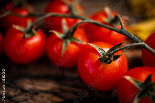 red tomatoes on vine