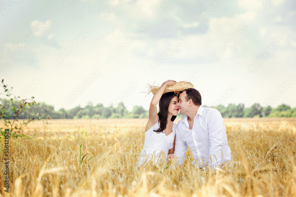 Tender young couple in the field