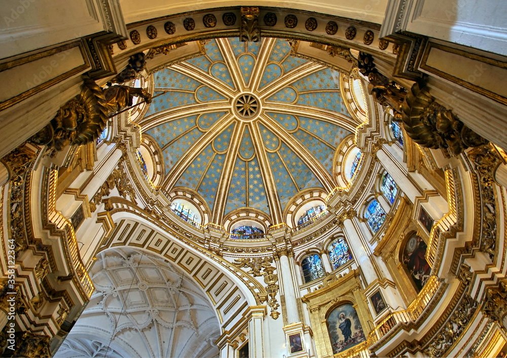 View of the dome Of the Cathedral of the Incarnation with its delicate stained glass windows in Granada, Spain