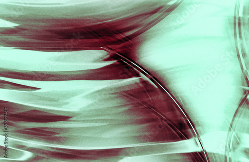 Grainy analogue effect abstract of spherical swirls and twirls in red and green photo
