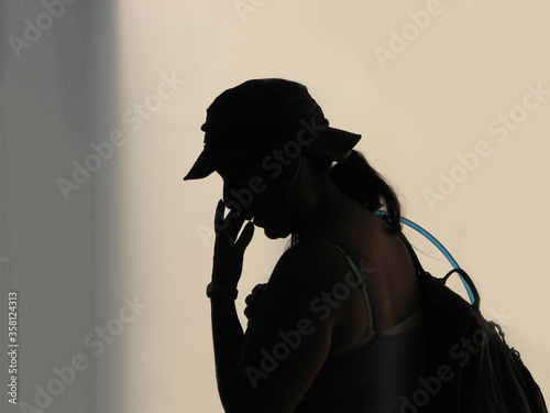 silhouette of a young woman