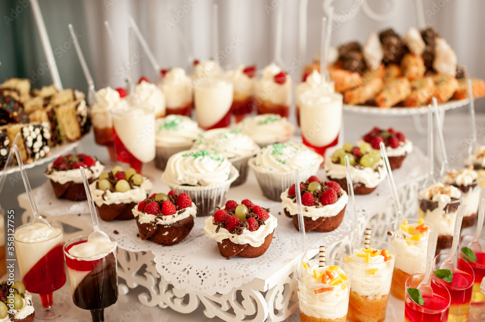 Sweet cakes at a wedding buffet. Catering Sweet cakes at a wedding buffet. Catering