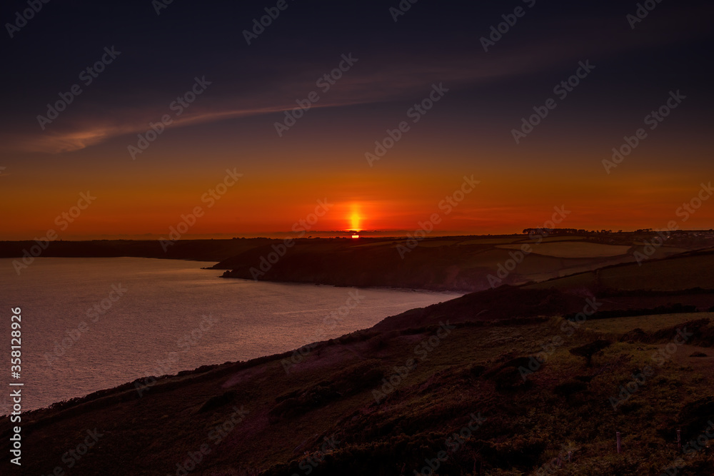Landscape over a bay of water in Cornwall