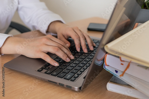 Happy young girl student watch webinar listen online course communicate by conference video call