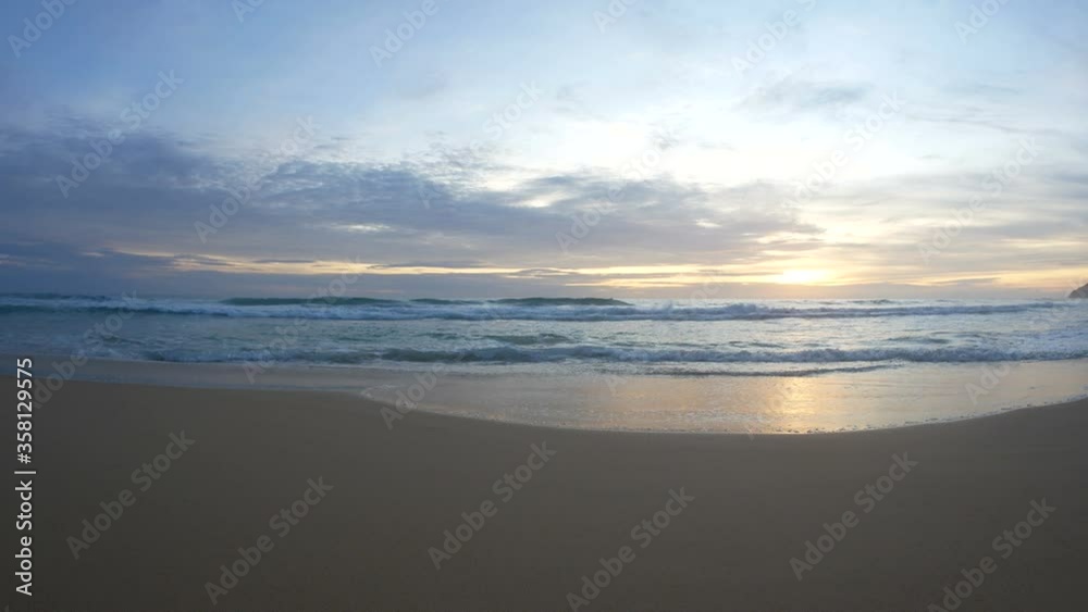 sea wave water hit sand beach , reflection in water, cloudy sky with sunset background sea wave water hit sand beach , reflection in water, cloudy sky with sunset background